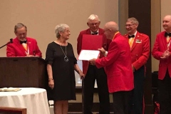 Ann-Daughtry-widow-of-Jim-Daughtry-accepts-Alabama-Devil-Dog-of-the-Year-award-on-behalf-of-Jim